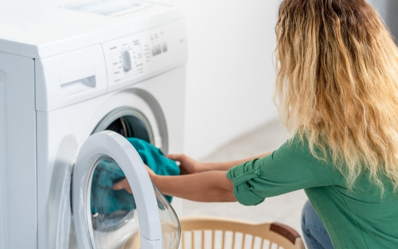clothing is hot to the touch after drying or smells smoky